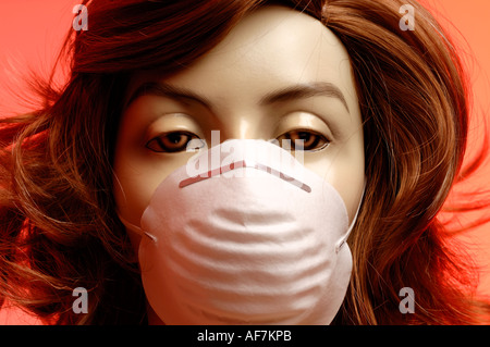 Tête de mannequin femme portant un masque de visage Banque D'Images