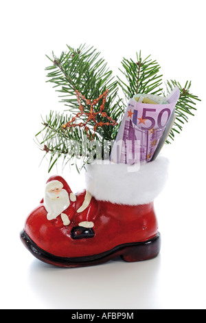 Santa boot avec de l'argent Banque D'Images