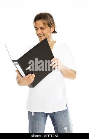 Man holding folder, close-up Banque D'Images