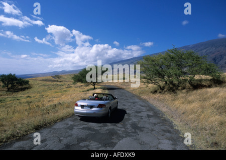 Sur l'Autoroute, Convertible Piilani Highway, près de Kaupo, Maui, Hawaii, USA Banque D'Images