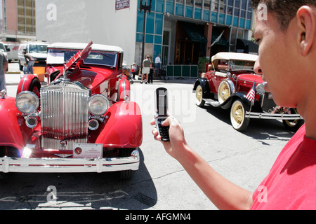 Miami Florida,Flagler Street,Classic car cars Show,antique Packard,voitures,voitures,automobiles,automobiles,automobiles,automobiles,automobiles,automobiles,véhicule,véhicules,rouge,hispanique Latin Banque D'Images