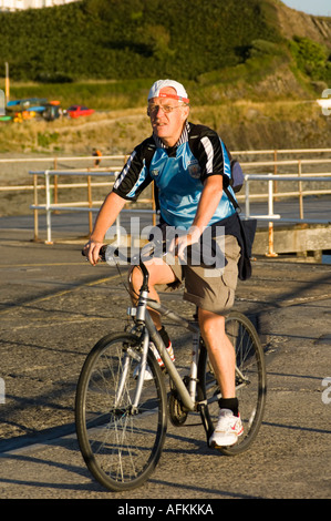 Middle aged man on bicycle bike Aberystwyth Wales UK Banque D'Images