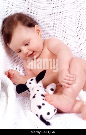 Bébé (12-15mois) holding toy Banque D'Images