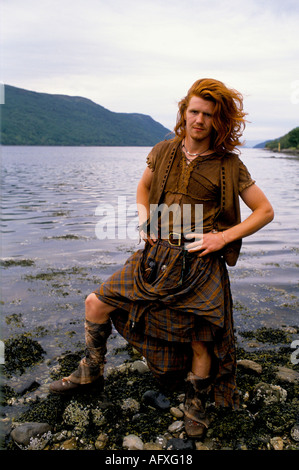 Kilts The Clan une robe de groupe écossaise de reconstitution pour le Bataille de Culloden à Glen Croe Écosse années 1990 HOMER Royaume-Uni SYKES Banque D'Images