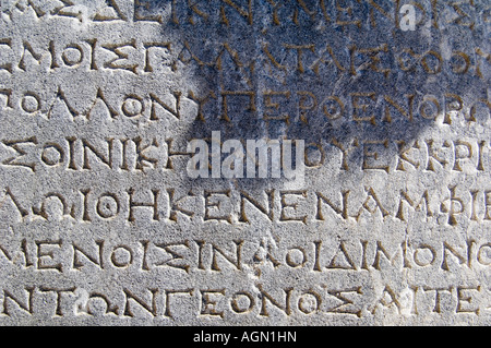 L'écriture grecque dans les ruines sur Délos, près de Mykonos, Grèce. Banque D'Images