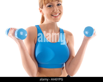 Young woman lifting weights parution modèle Banque D'Images