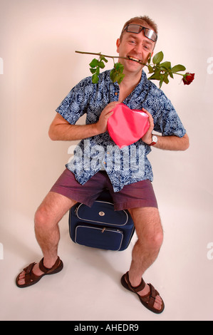 STUDIO PORTRAIT ILLUSTRANT LES HOMMES VA EN VACANCES À TROUVER L'AMOUR Banque D'Images