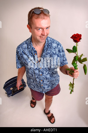 STUDIO PORTRAIT ILLUSTRANT LES HOMMES VA EN VACANCES À TROUVER L'AMOUR Banque D'Images