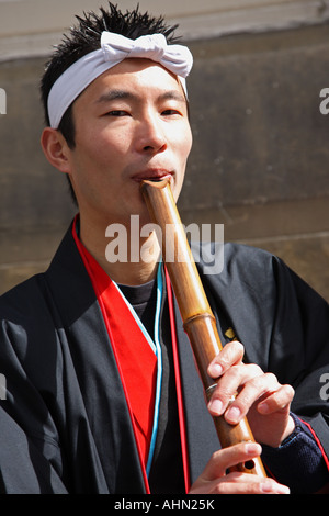 Joueur de flûte japonaise au festival Fringe d'Ecosse Banque D'Images