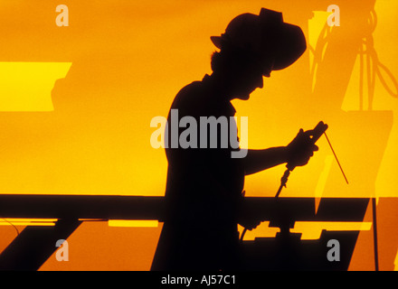 Travailleur de la construction en acier de soudure sur chantier Banque D'Images