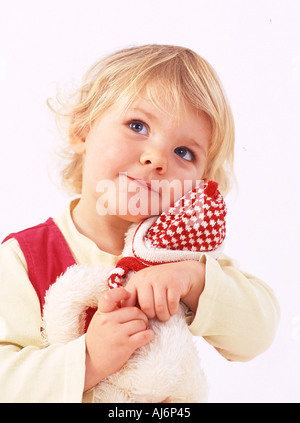 Tout-petit enfant Enfant 0 5 peau claire dodus juste juste aux cheveux bouclés blonds heureux réfléchis joues roses Banque D'Images