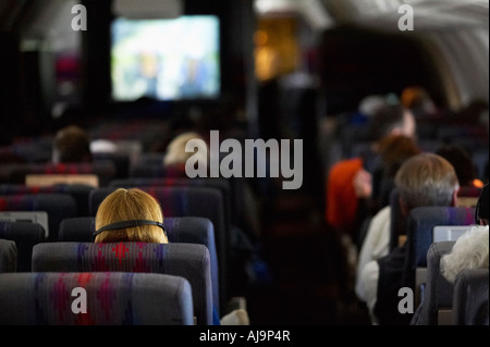 Les gens à bord d'un avion Banque D'Images