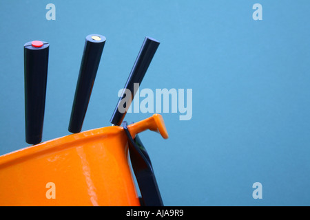 La fondue sur un fond bleu Banque D'Images