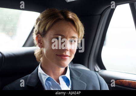 Businesswoman in Car Banque D'Images