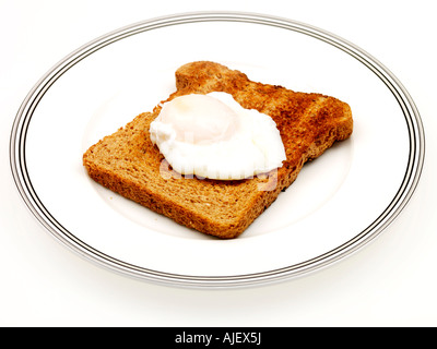 Œufs pochés sur toast complet Banque D'Images