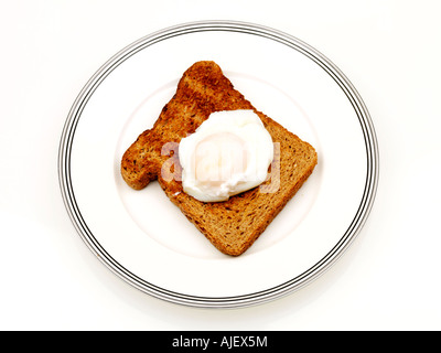 Œufs pochés sur toast complet Banque D'Images