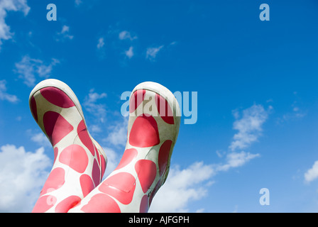 Bottes en caoutchouc dans l'air Banque D'Images