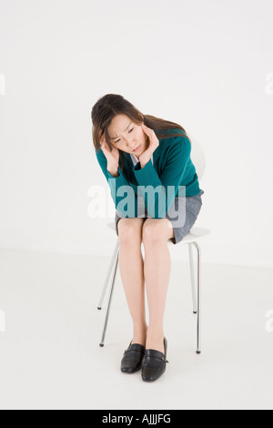 Jeune femme inquiète Banque D'Images