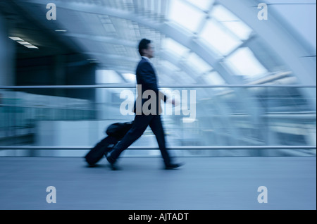 Portrait of a businessman pulling son assurance Banque D'Images