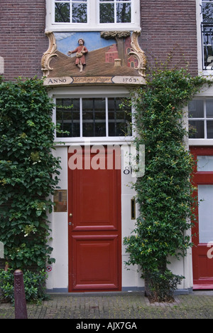 Maison avec façade décorative en pierre sculptée datée 1763 Bloemgracht Jordaan Amsterdam Hollande Pays-bas Europe Banque D'Images
