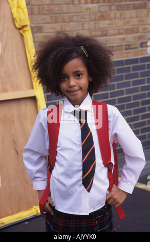 Confident happy little schoolgirl Banque D'Images