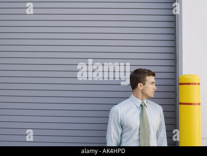 Business man post jaune Banque D'Images