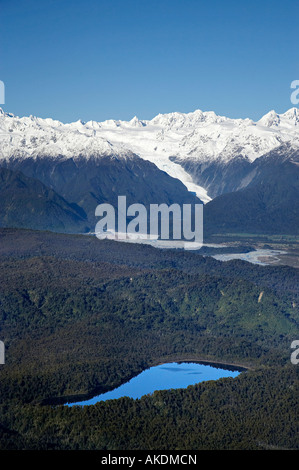 Lac alpin de Franz Josef Glacier des Alpes du Sud et Côte ouest de l'île du Sud Nouvelle-zélande aerial Banque D'Images