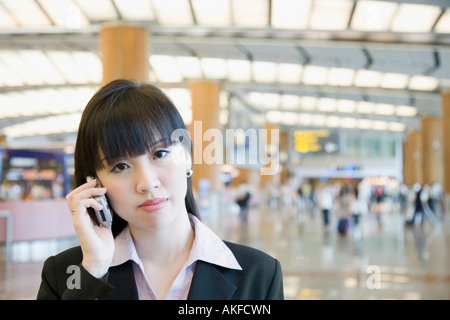 Portrait of a man at an airport lounge Banque D'Images