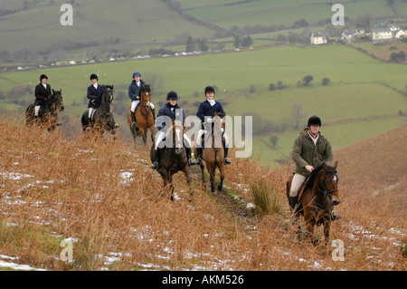 Une partie de l'équitation à travers la recherche de Llangeinor colline au-dessus de Blackmill près de Bridgend sur le Boxing Day annuel Fox hunt Banque D'Images