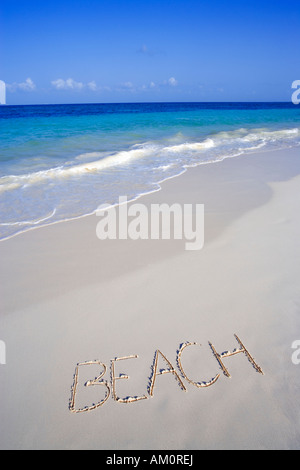 Le mot écrit sur la plage de sable blanc sur la plage tropicale à Playa del Carmen, Cancun, Mexique Banque D'Images