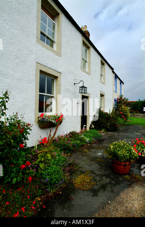 L'Île Sainte de la côte de Northumberland Lindisfarne House Chalet jardin Banque D'Images