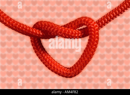 En forme de coeur rouge noeud ou noeud d'amour Banque D'Images