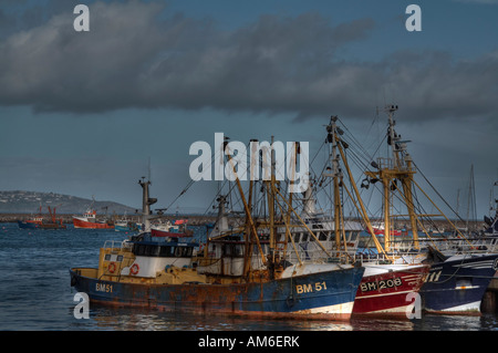 Chalutiers à perche en attente de la marée pour changer, leur permettant d'aller à la mer. Banque D'Images