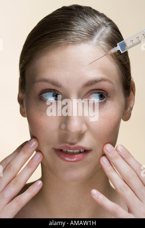 Une femme ayant un botox injection