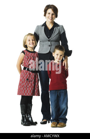 Femme avec deux enfants sourire Banque D'Images