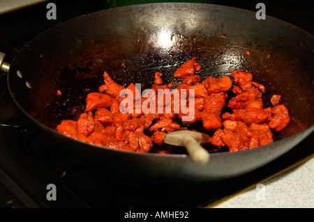 Être poulet sauté au wok Banque D'Images