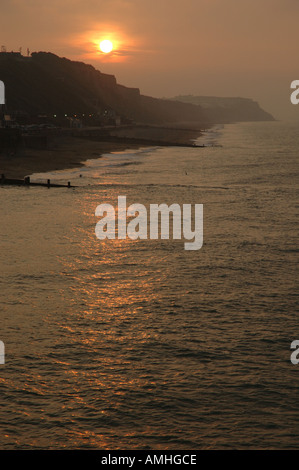 UK, coucher de soleil vu de jetée de Cromer Norfolk portrait Banque D'Images