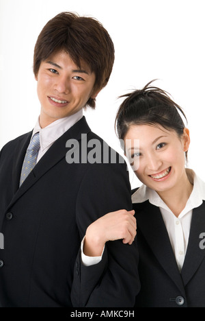 Portrait of young couple wearing suit Banque D'Images