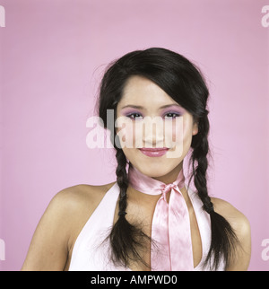 Young woman smiling, close-up Banque D'Images