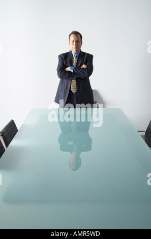 Businessman in Boardroom Banque D'Images