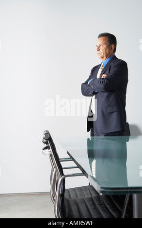 Businessman in Boardroom Banque D'Images