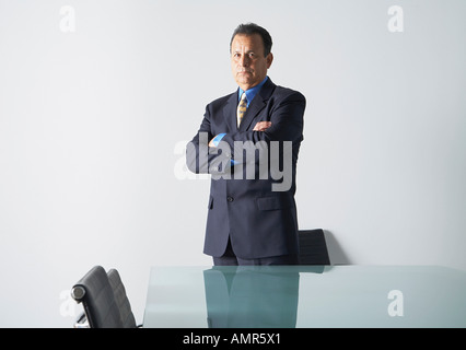 Businessman in Boardroom Banque D'Images