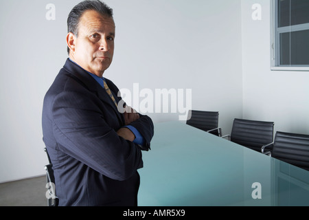 Businessman in Boardroom Banque D'Images