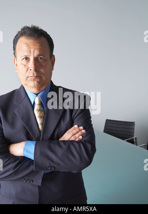 Businessman in Boardroom Banque D'Images