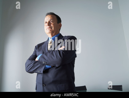 Businessman in Boardroom Banque D'Images