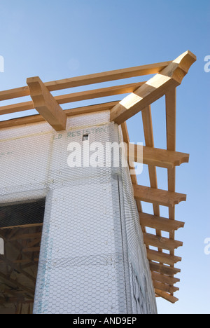 Image montre une maison en construction à la phase de toiture Banque D'Images