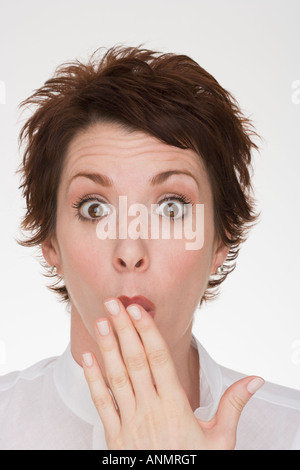 Femme faisant face surpris Banque D'Images