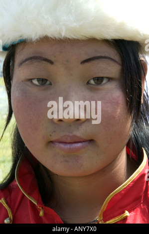 Femme en robe traditionnelle tibétaine, Lhassa, Tibet, Chine Banque D'Images
