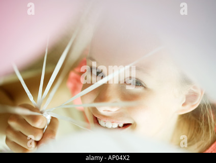 Girl holding bouquet de ballons, high angle view Banque D'Images