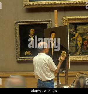 Peinture art student et étudier au Musée du Louvre à Paris France Banque D'Images